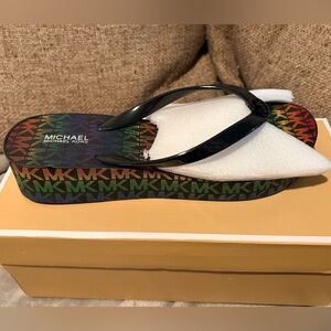 Michael Kors Black and Rainbow flip flops women’s 9